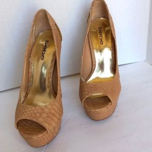 BeBe 5 in snake skin platform high heels tan size 7. Barely worn.